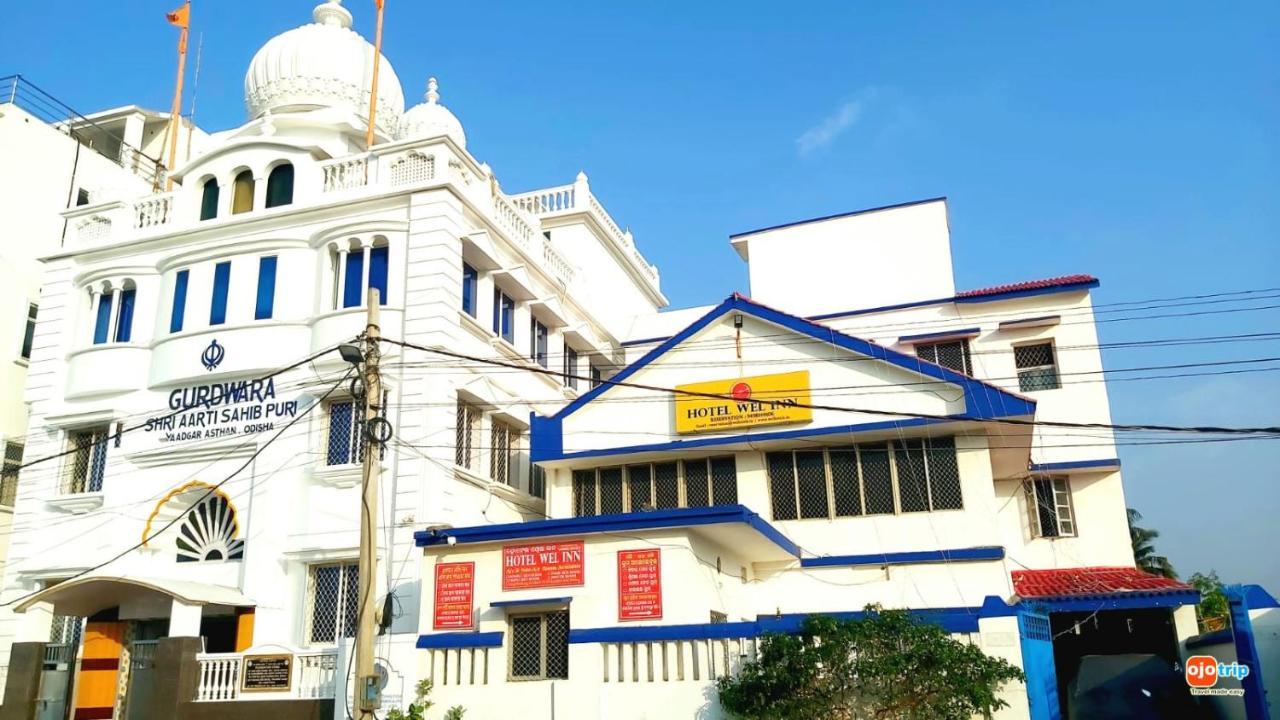 Hotel Well Inn Puri Bagian luar foto